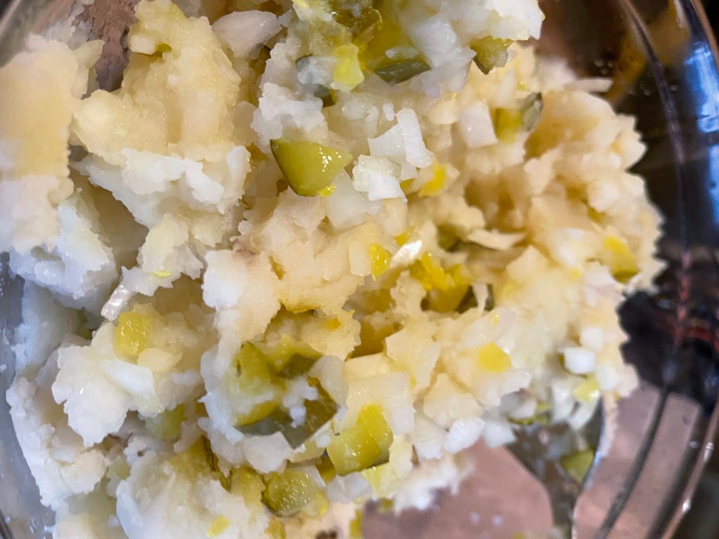 Add pickle soaked onion, pickle juice and chopped pickles
BBQ Potato Salad Recipe